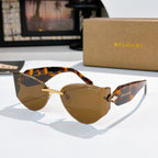 Bvlgari cat-eye sunglasses, tortoise frame, brown lenses, gold hinge detail.