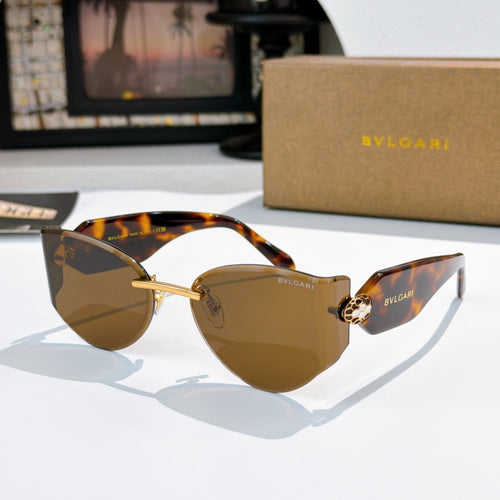 Bvlgari cat-eye sunglasses, tortoise frame, brown lenses, gold hinge detail.