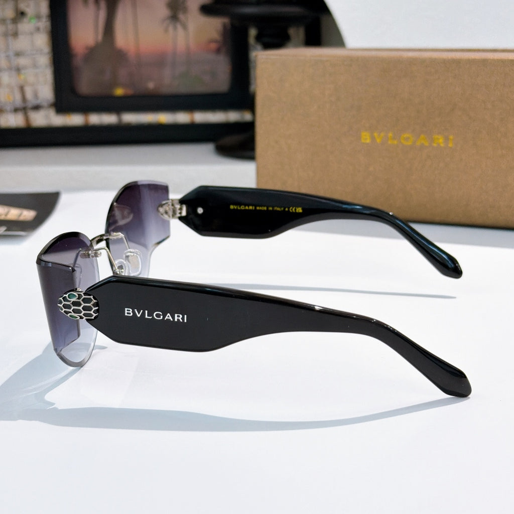 Bvlgari cat-eye sunglasses, black frame with purple lenses, side logo temple.