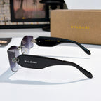 Bvlgari cat-eye sunglasses, black frame with purple lenses, side logo temple.