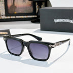 Sunglasses with purple-tinted lenses, black frame, and silver ornate temple details.