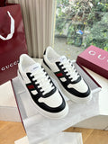 Gucci low-top sneakers, white leather with black panels and multicolor stripe