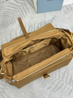 Tan bag interior view with long zipper, braided pull tab, and open top