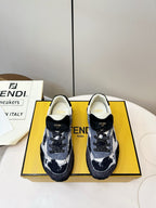 Fendi unisex sneakers in navy and white with black heel and front FENDI logos