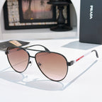Prada sunglasses with black frame and rose gradient lenses