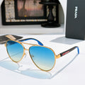 Prada sunglasses with gold frame and blue gradient lenses