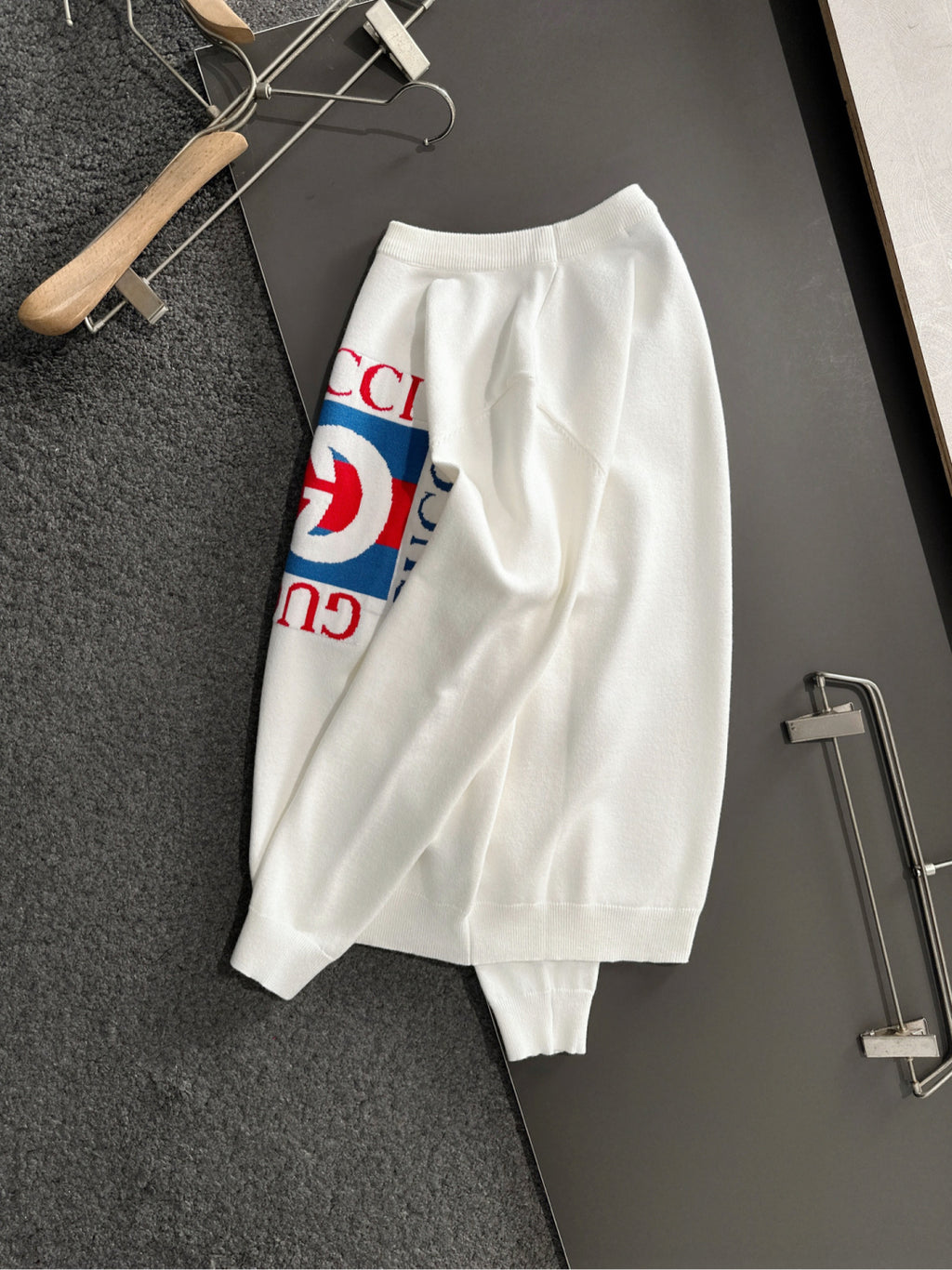 White crewneck sweatshirt with Gucci logo graphic print, long sleeves