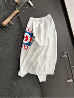 White crewneck sweatshirt with Gucci logo graphic print, long sleeves