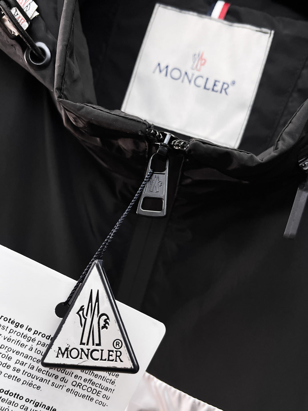 Moncler long black jacket front zipper with hood drawcord and logo label