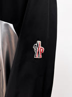 Moncler long black jacket sleeve logo patch