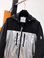 Moncler long two-tone jacket with hood, full-length zipper, and logo badge