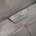 Men's Louis Vuitton leather backpack interior label on gray fabric lining
