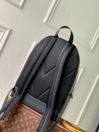 Men's Louis Vuitton leather backpack back view with padded straps and back panel