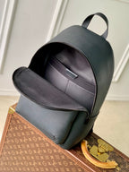 Men's Louis Vuitton leather backpack front view with main zipper and front compartment