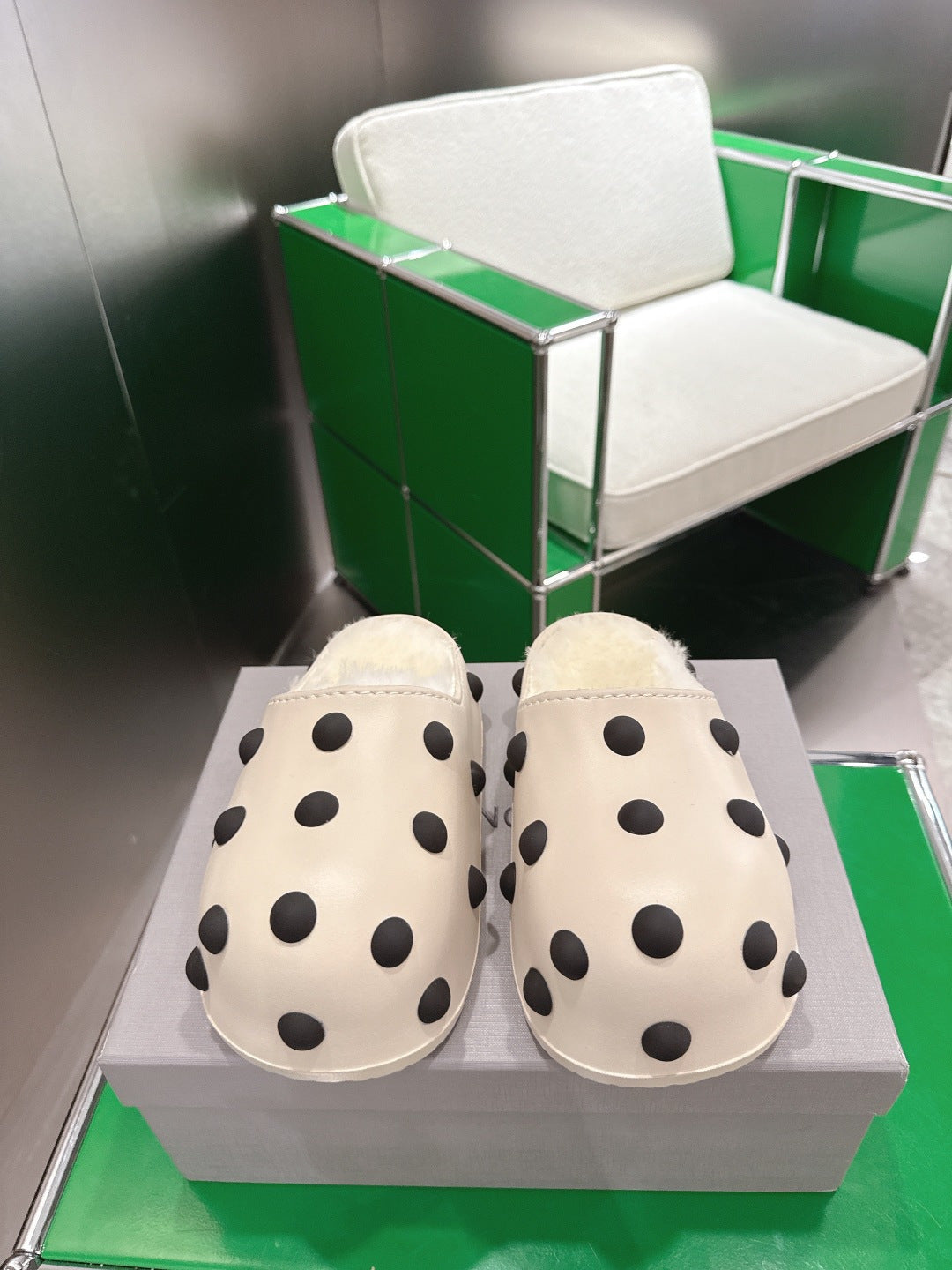 Balenciaga white polka-dot slide sandals with plush lining, front pair