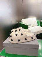 Balenciaga white polka-dot slide sandal with plush trim, side front close-up