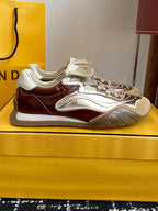 Fendi unisex sneakers with metallic silver panels, brown side trim, and lace-up front