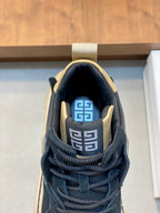 Navy high-top sneaker with Greek-key logo embroidery on the tongue lining