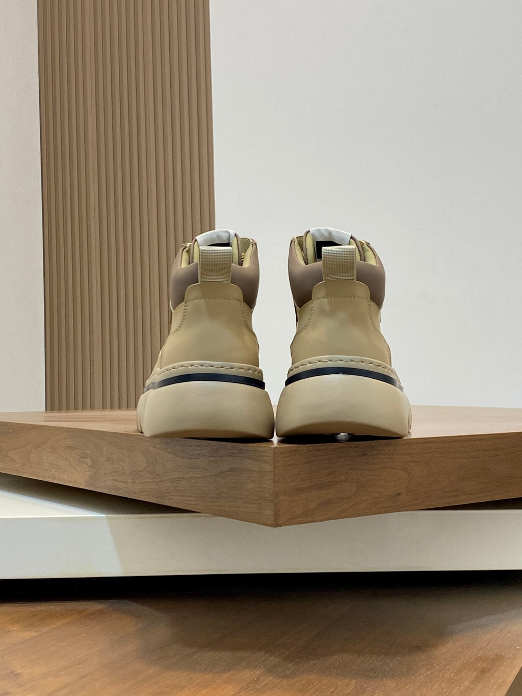 Givenchy luxury shoes, back view of cream lace-up sneakers with padded heel and straps