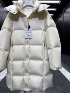 Light cream quilted puffer coat with hood, front placket, diamond stitching, long sleeves.