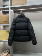 Black puffer jacket, stand collar and quilted yoke, full-zip