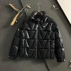 Black long puffer jacket with full front zipper and stand collar