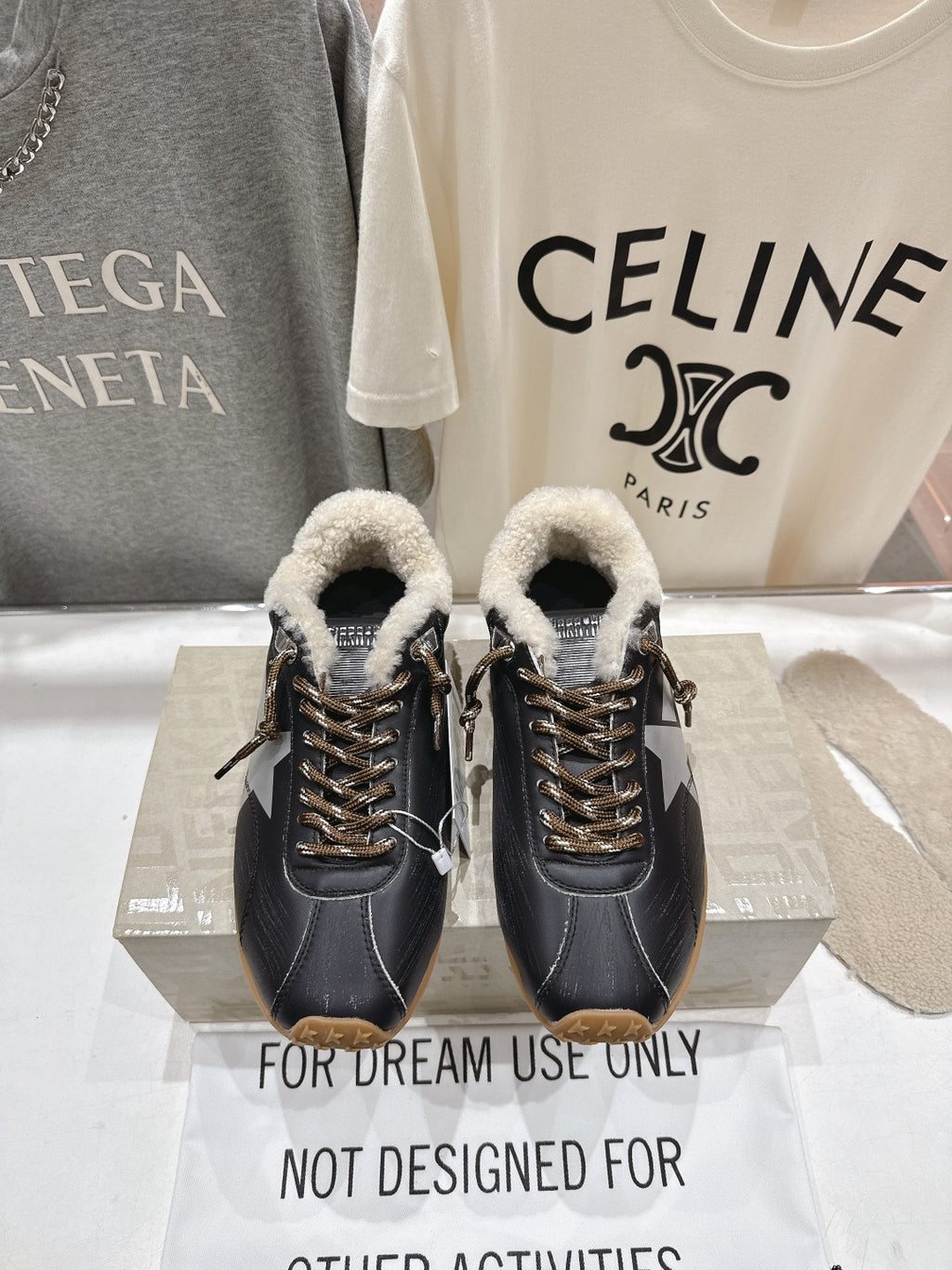 Golden Goose black leather sneaker with shearling collar, gold laces, gum sole
