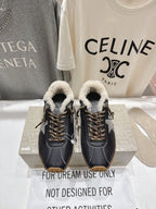 Golden Goose black leather sneaker with shearling collar, gold laces, gum sole