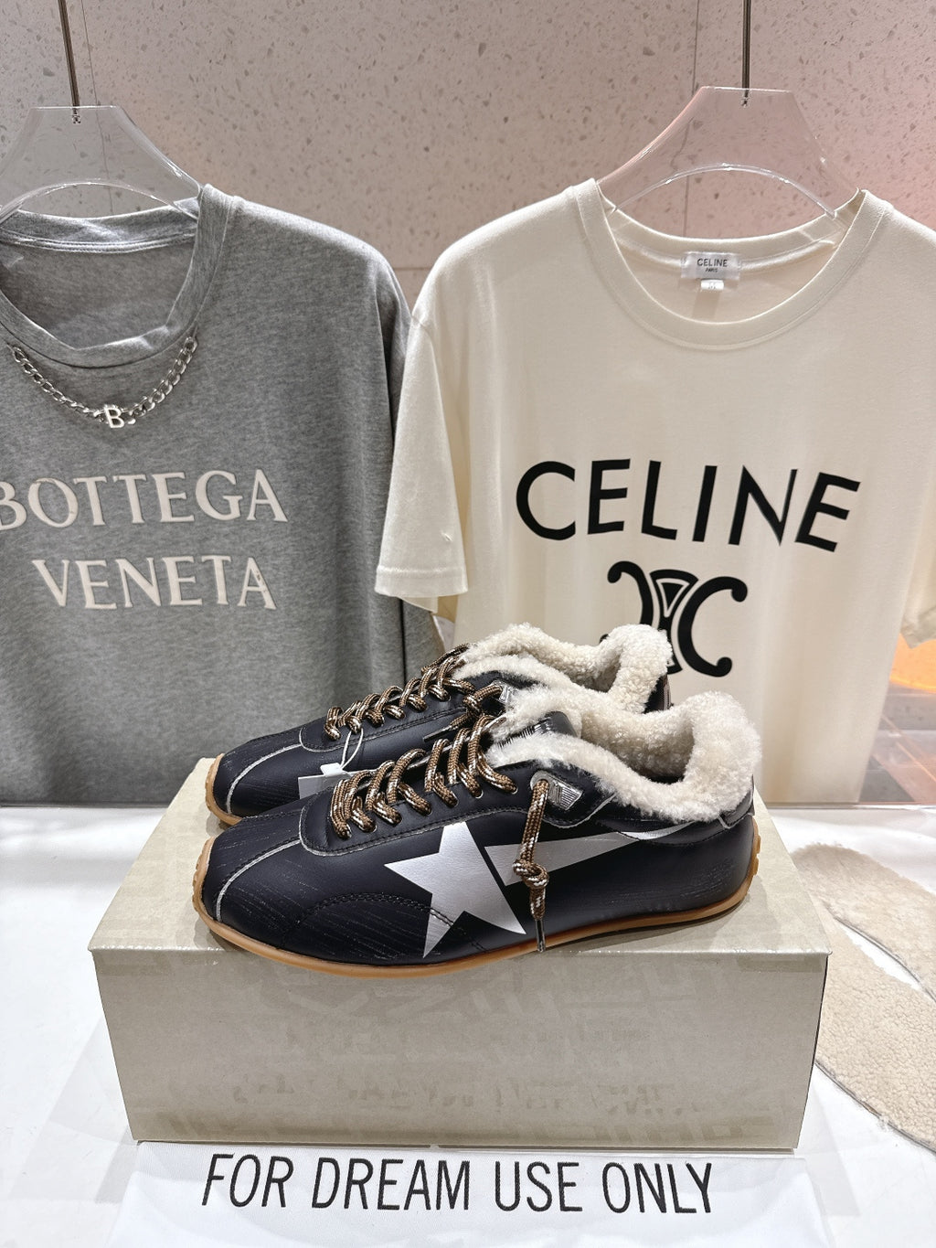 Golden Goose black lace-up sneaker with shearling collar, star side detail, gum sole