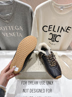 Golden Goose black sneaker outsole view with gum tread pattern and shearling collar