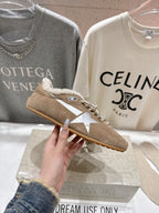 Golden Goose tan suede lace-up sneakers with shearling trim and gum sole