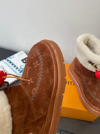Louis Vuitton monogram suede boots with shearling lining and red heart lace charms