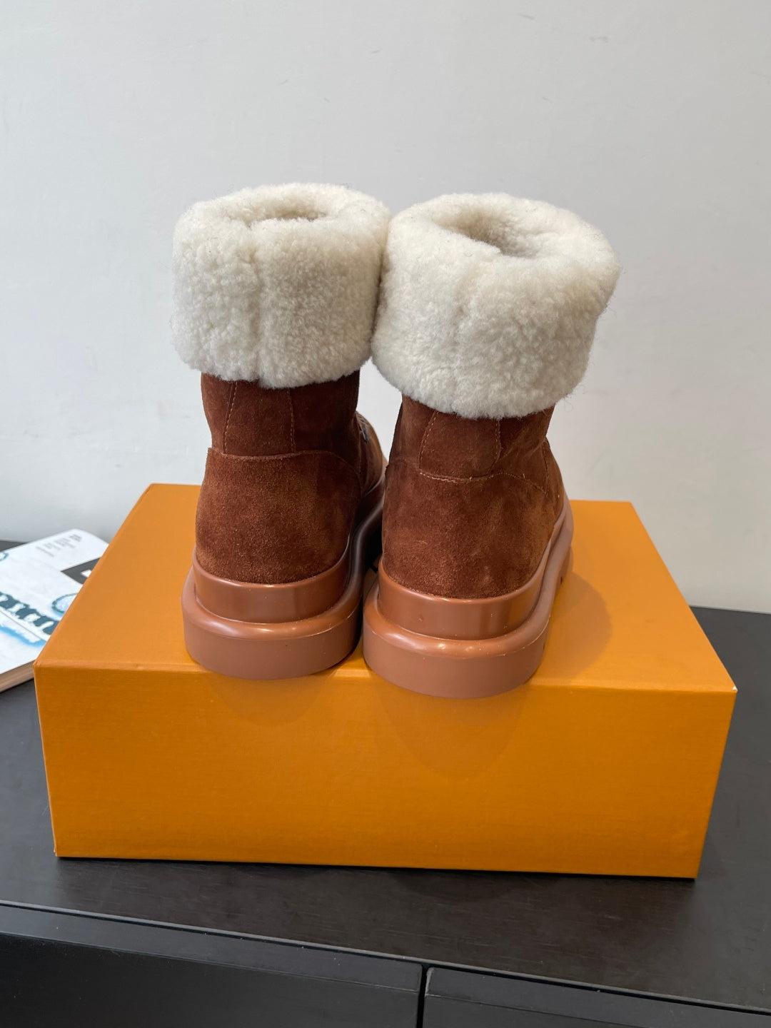 Louis Vuitton monogram suede ankle boots with shearling cuffs and brown rubber soles