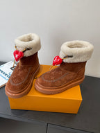 Louis Vuitton monogram suede ankle boots with shearling trim and red heart charms, pair