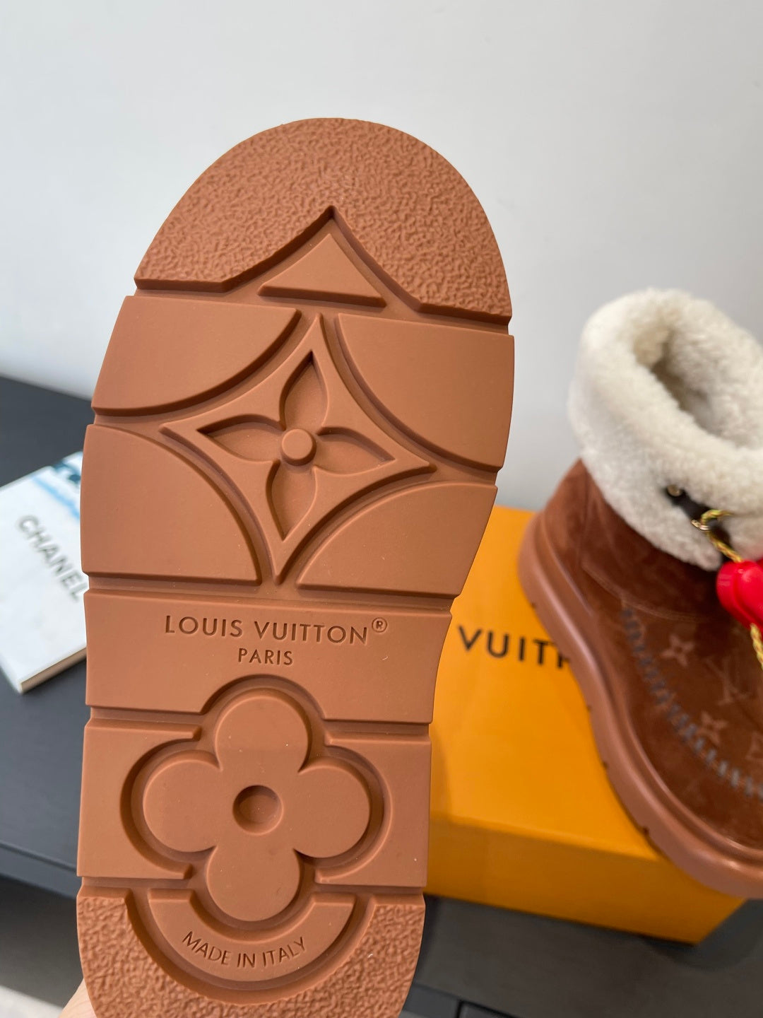Louis Vuitton monogram rubber boot outsole with molded flower logo pattern