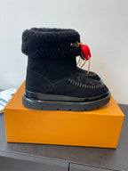 Black ankle boots with plush cuffs, monogram side, red heart charm on lace
