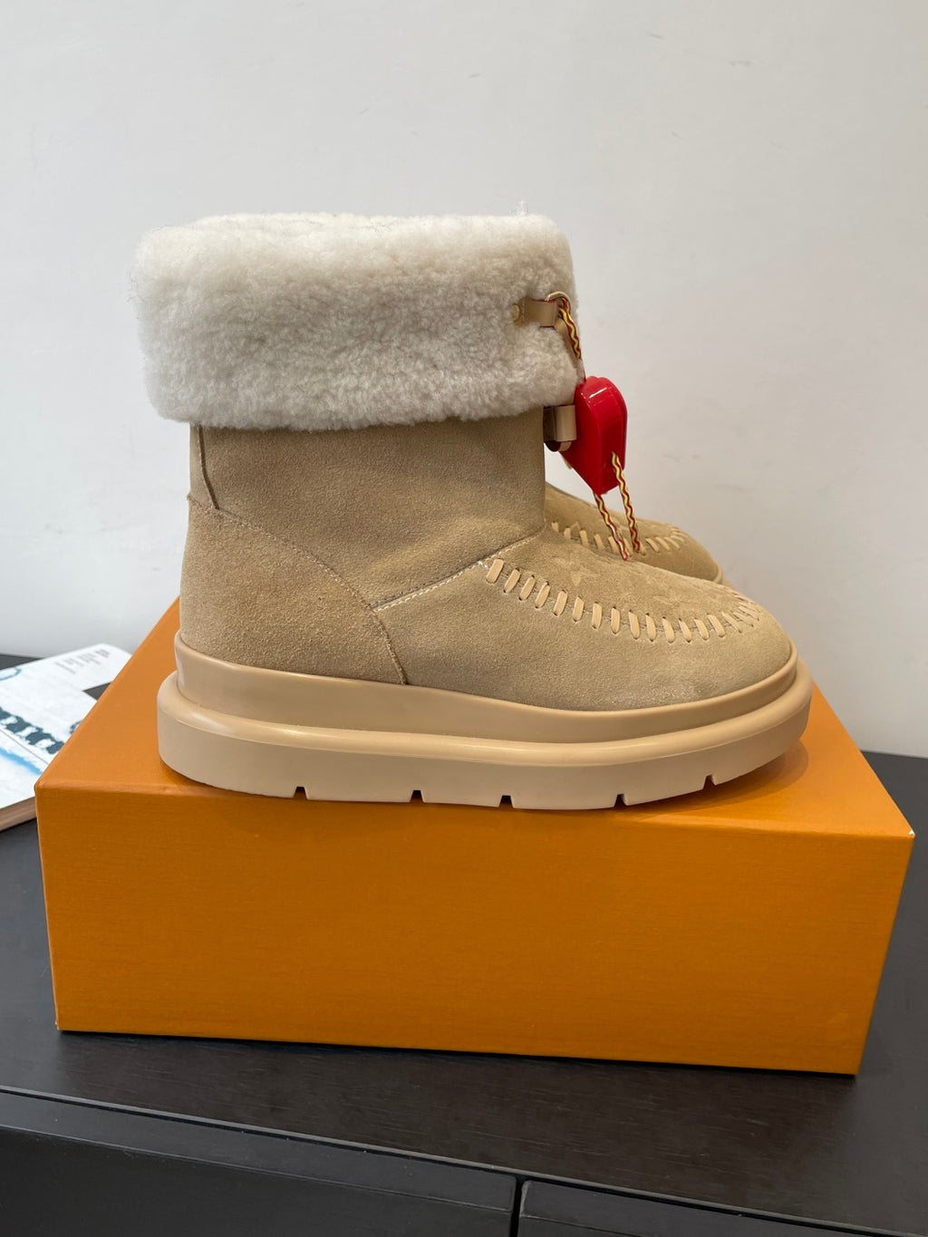 Louis Vuitton unisex suede shearling boot, tan, with red heart charm detail