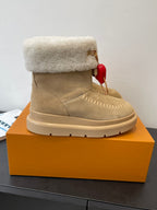 Louis Vuitton unisex suede shearling boot, tan, with red heart charm detail