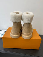 Louis Vuitton unisex tan suede shearling boots, rear view with fluffy cuffs