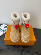 Louis Vuitton unisex suede shearling boots, tan, with red heart charm on gold chain