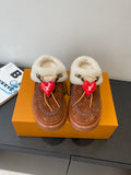 Brown suede slip-on shoes with cream shearling lining and red heart LV charm