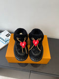 Black shearling slip-on shoes with red heart LV charms and braided laces
