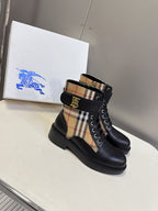 Black lace-up ankle boots with plaid side insert and gold-tone TB logo buckle