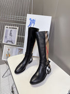 Burberry black knee-high leather boots with plaid inserts and adjustable buckle straps