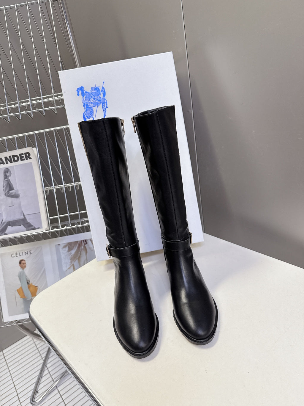 Burberry black knee-high leather boots, pull-on style with low stacked heel