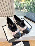 Black and tweed ballet flats with bow and gold-tone logo detail
