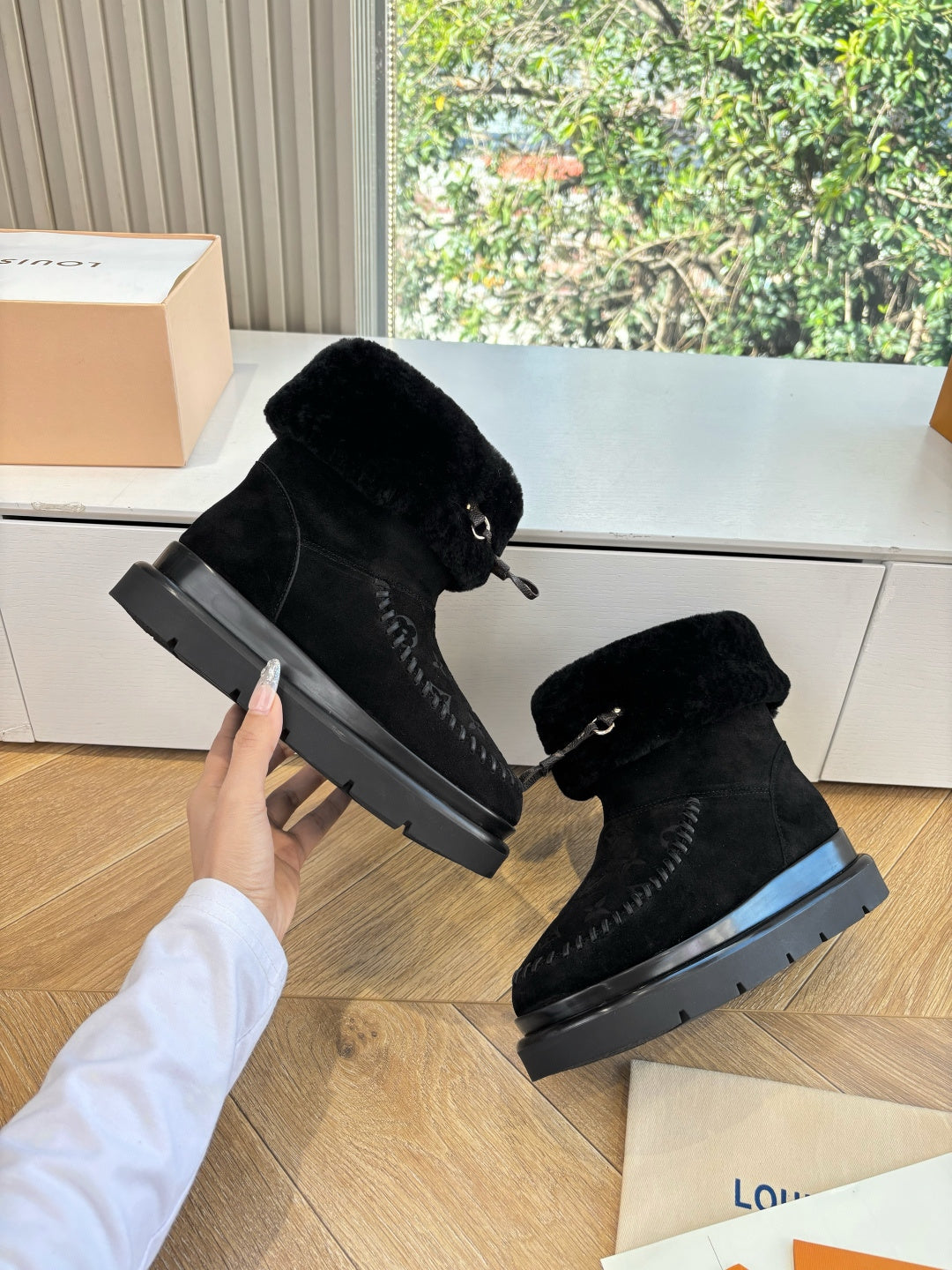 Louis Vuitton unisex black ankle boots with buckle strap and textured monogram