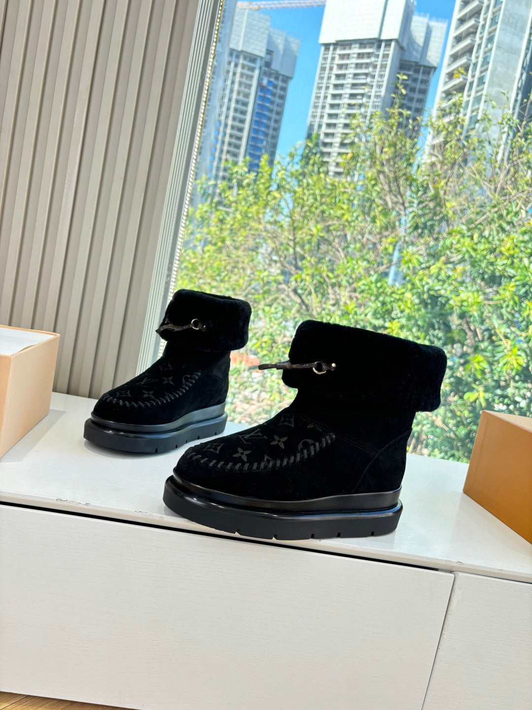 Louis Vuitton unisex black lace-up boots with fur lining, side monogram, rubber sole
