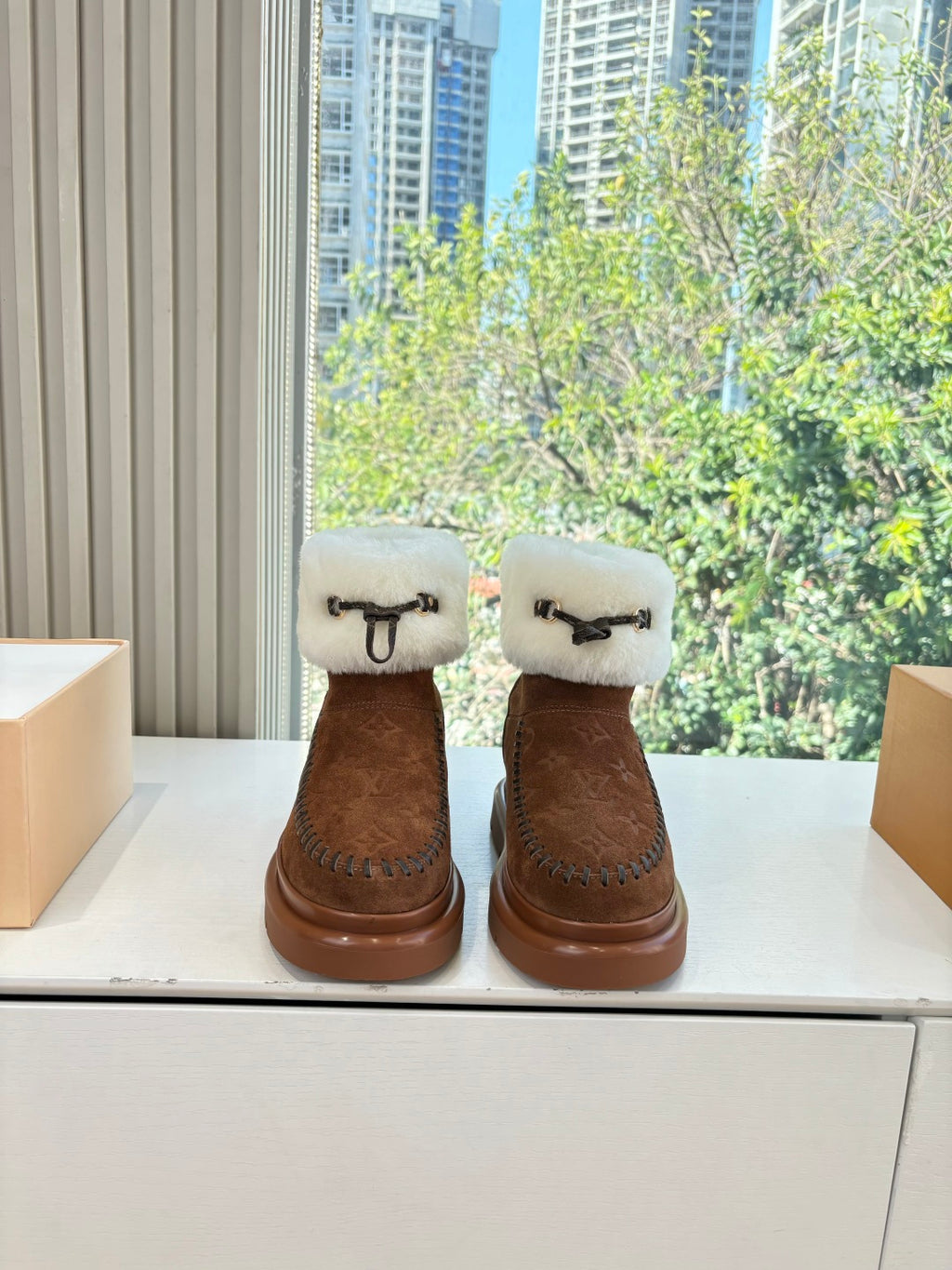 Louis Vuitton ankle boots, dark brown suede with cream faux-fur cuffs and monogram detailing