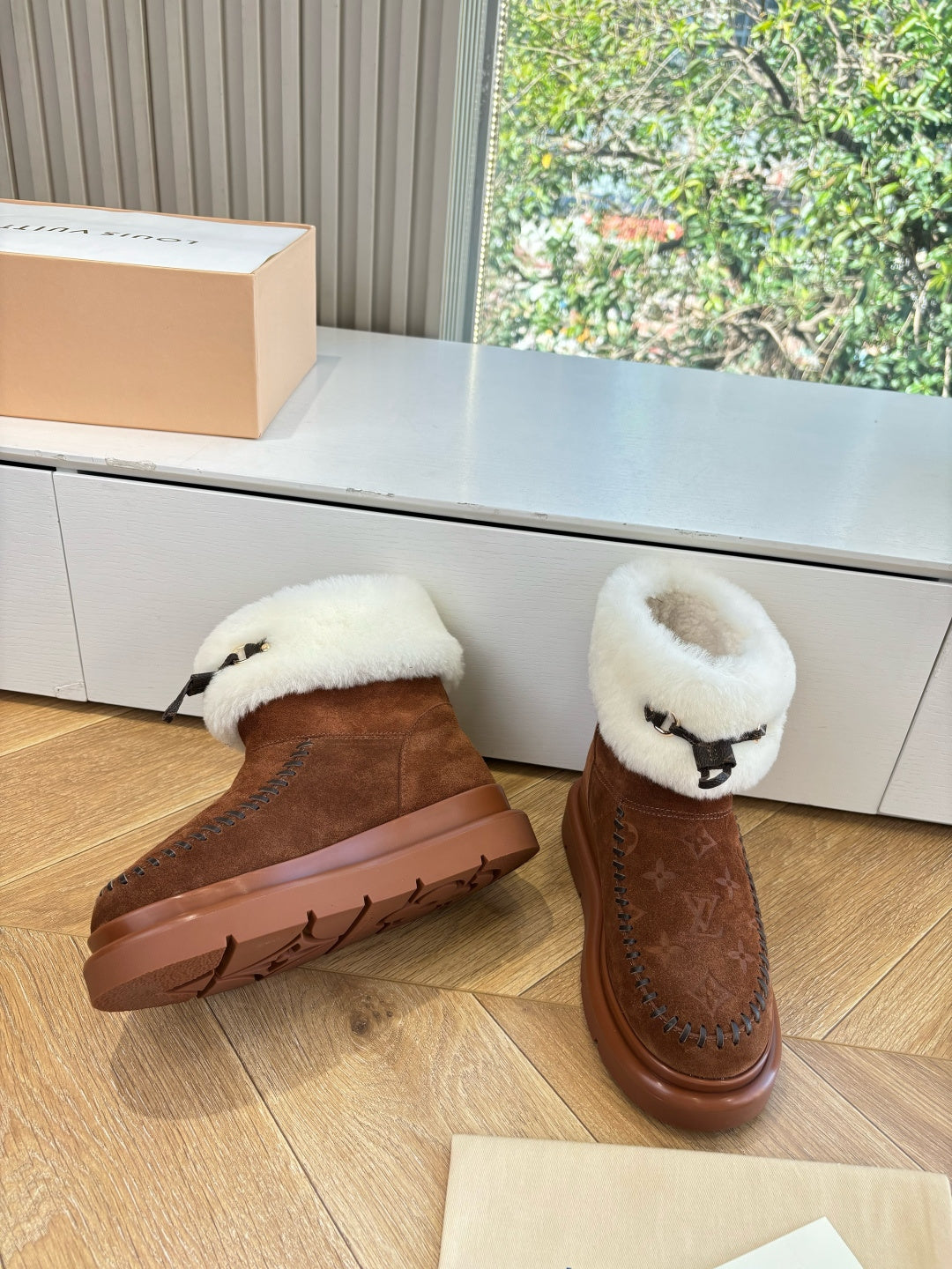 Louis Vuitton ankle boots, dark brown suede with cream faux-fur lining and cushioned sole